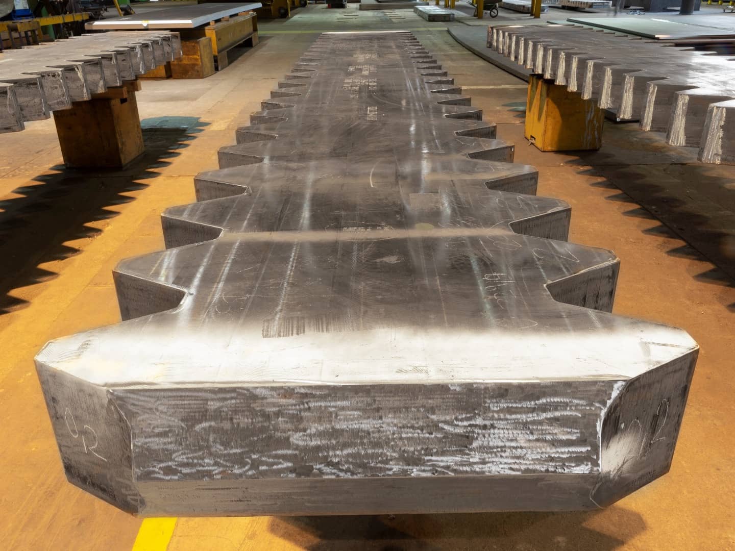 Precision-cut offshore jack-up rig gear rack components, crafted from ultra-high-strength 690Mpa structural steel.